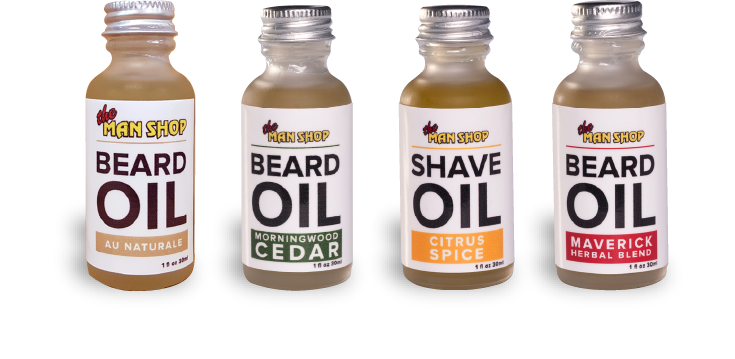 All four types of The Man Shop Beard Oil bottles.